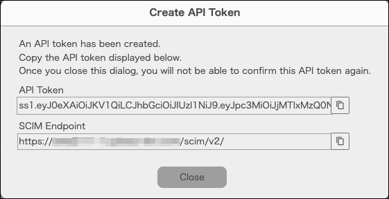 Screenshot: The created API token and the SCIM endpoint are displayed in the "Create API Token" dialog