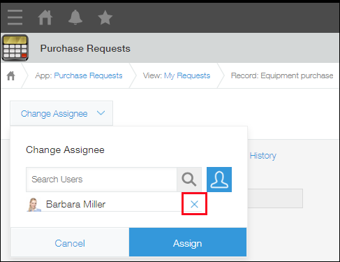 Screenshot: The current assignee is displayed after "Change Assignee" is clicked on the "Record Details" screen. The "Delete" button to the right of the assignee is outlined in red.